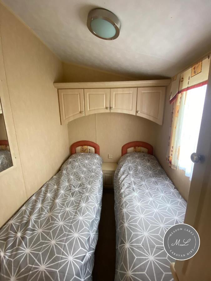 Coral - Row 73 2, Heating, Wifi, Bed Linen - Meadow Lakes Caravan & Hire *